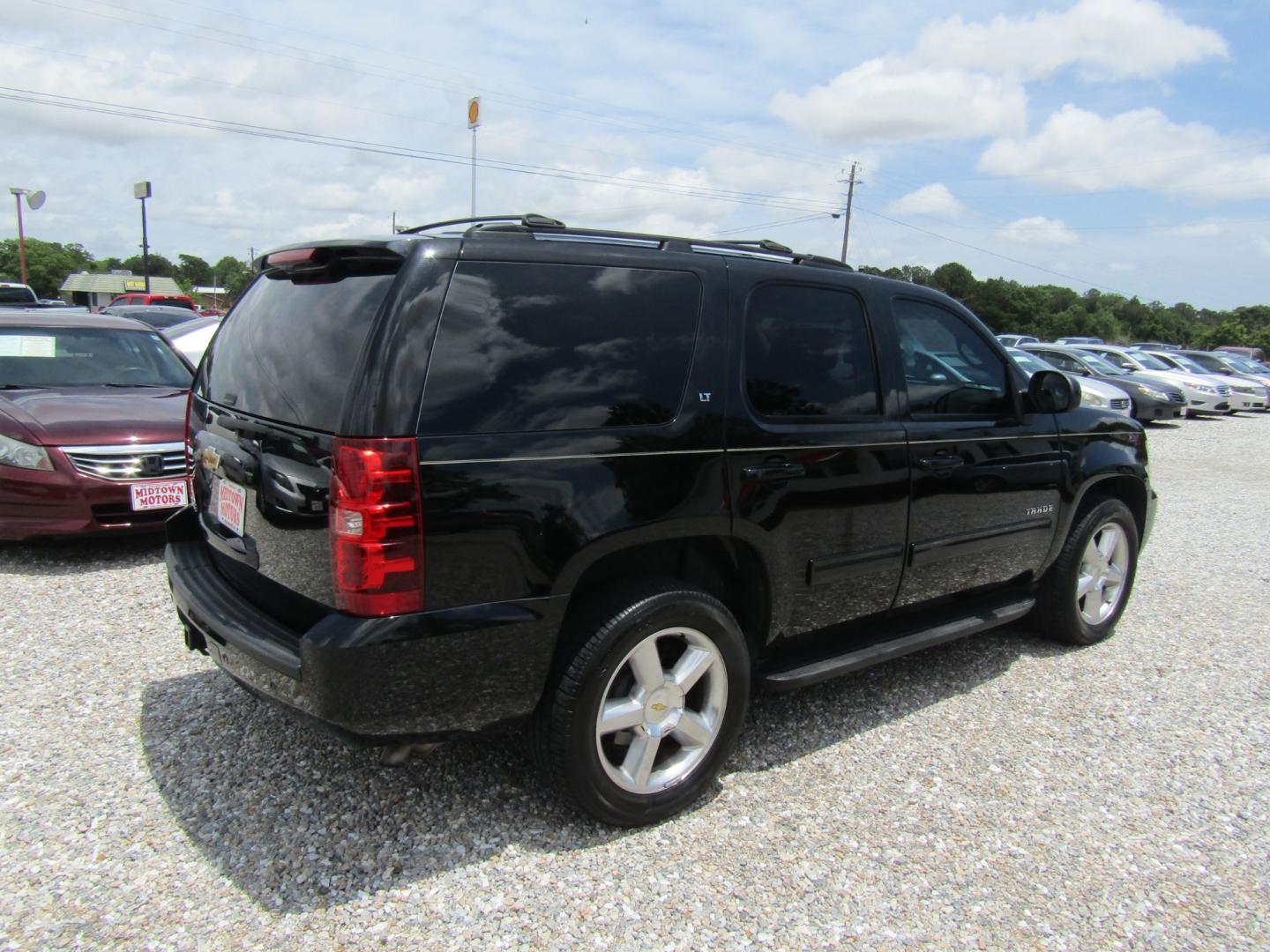 2014 Black /Tan Chevrolet Tahoe (1GNSCBE00ER) with an V8 engine, Automatic transmission, located at 15016 S Hwy 231, Midland City, AL, 36350, (334) 983-3001, 31.306210, -85.495277 - Photo#7